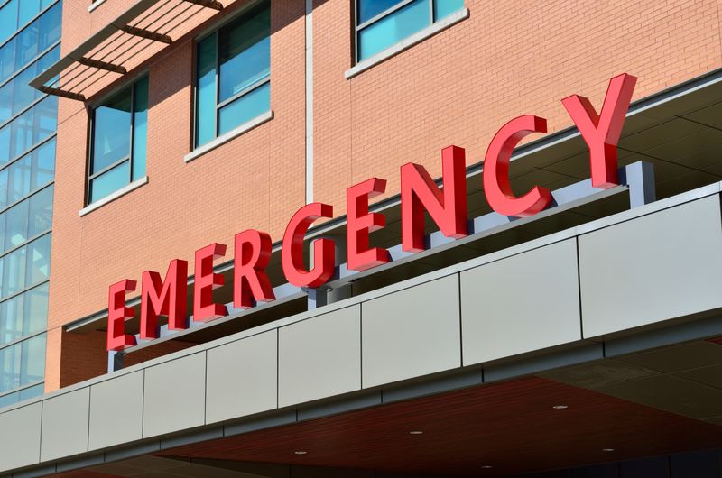 Child in a hospital bed recovering from an injury